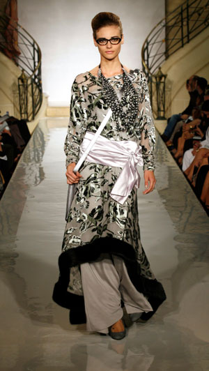 A model presents a creation by French designer Pascal Millet for Carven as part of his Autumn/Winter 2007-2008 Haute Couture fashion show in Paris, July 4, 2007.