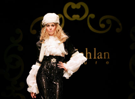 A model displays a creation from Lebanese fashion designer Ella Zahlan's autumn/winter collection in Rome during Rome Fashion Week July 12, 2007.