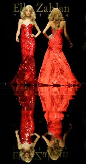 Models display creations from Lebanese fashion designer Ella Zahlan's autumn/winter collection in Rome during Rome Fashion Week July 12, 2007.