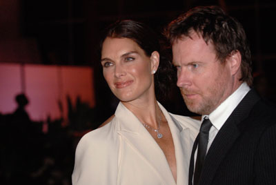 Actress Brooke Shields (L) and husband Chris Henchy pose for photographers at a party held at the Museum of Contemporary Art in Los Angeles July 22, 2007.
