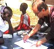 Painter takes art therapy to young people in Uganda