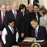 Obama signs historic health care bill
