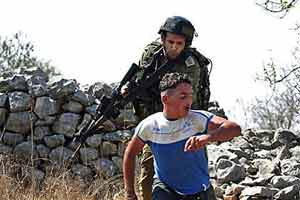 Israeli settlers clash with Palestinians in West Bank