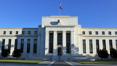 Federal Reserve scales back stimulus effort 美联储启动消减量化政策