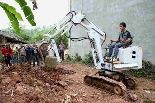 Man home makes excavator
