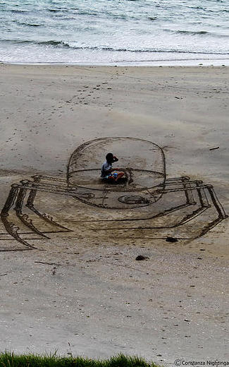 沙滩上的3D艺术沙画