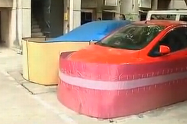 中国司机发明了“汽车裙”来防范老鼠