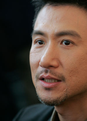 Hong Kong singer Jacky Cheung speaks during a news conference of his world tour concert in Hong Kong August 15, 2007. 