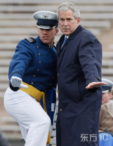 Bush plays chest-bumping with Air Force cadet