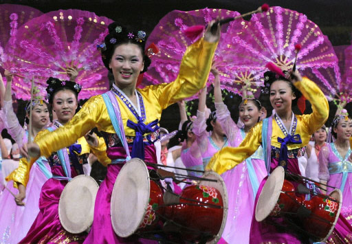 Female dancers in traditional Chinese constumes at the opening