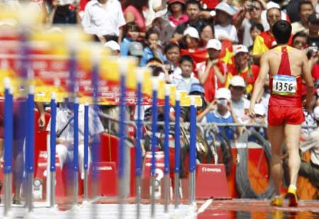 Liu Xiang quits 110m hurdles