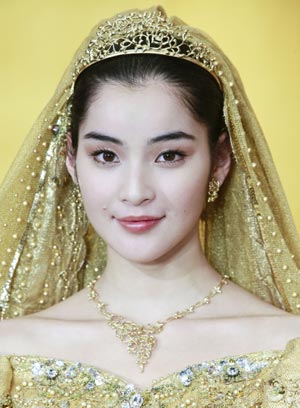 Gold thread made wedding dresses displayed in Japan