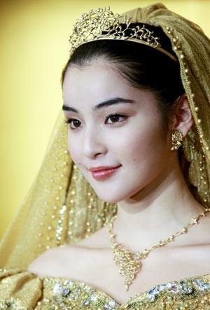 Gold thread made wedding dresses displayed in Japan