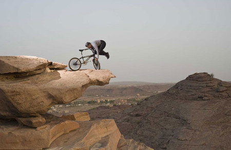 61-yr-old does balancing acts with BMX on cliff edges