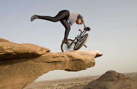 61-yr-old does balancing acts with BMX on cliff edges