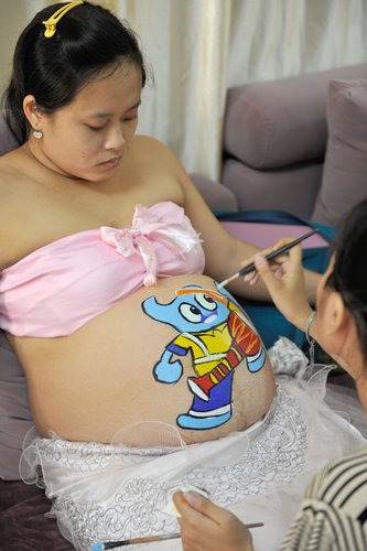 Turning pregnant bumps into art